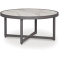  Signature Design by Ashley Ocean Beach PCP510-708 Round Cocktail Table IMAGE 1